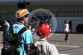 World © Octane Photographic Ltd. Formula 1 - Japanese Grand Prix - Sunday - Paddock.Japanese fans in camera hats. Suzuka Circuit, Suzuka, Japan. Sunday 8th October 2017. Digital Ref:1978LB1D9818