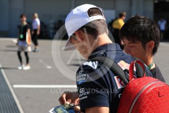 World © Octane Photographic Ltd. Formula 1 - Japanese Grand Prix - Sunday - Paddock. Pierre Gasly - Scuderia Toro Rosso STR12. Suzuka Circuit, Suzuka, Japan. Sunday 8th October 2017. Digital Ref:1978LB1D9905