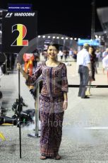World © Octane Photographic Ltd. Formula 1 - Singapore Grand Prix - Paddock. Stoffel Vandoorne's grid girl - McLaren MCL32. Marina Bay Street Circuit, Singapore. Sunday 17th September 2017. Digital Ref: