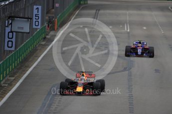 World © Octane Photographic Ltd. Formula 1 - Singapore Grand Prix - Practice 1. Daniel Ricciardo - Red Bull Racing RB13 and Sean Gelael - Scuderia Toro Rosso STR12. Marina Bay Street Circuit, Singapore. Friday 15th September 2017. Digital Ref: 1958LB1D8483