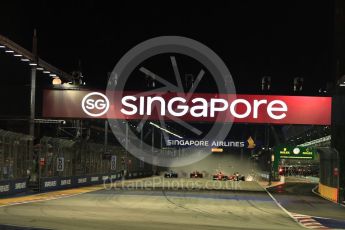 World © Octane Photographic Ltd. Formula 1 - Singapore Grand Prix - Race. The Scuderia Ferrari SF70Hs of Vettel and Raikkonen make contact. Marina Bay Street Circuit, Singapore. Sunday 17th September 2017. Digital Ref:
