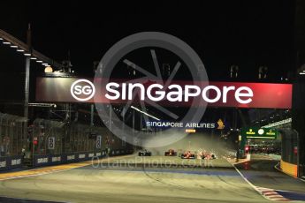 World © Octane Photographic Ltd. Formula 1 - Singapore Grand Prix - Race. The Scuderia Ferrari SF70Hs of Vettel and Raikkonen make contact. Marina Bay Street Circuit, Singapore. Sunday 17th September 2017. Digital Ref: