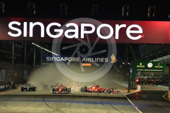 World © Octane Photographic Ltd. Formula 1 - Singapore Grand Prix - Race. Raikkonen spins in his Scuderia Ferrari SF70H after contact with Vettel. Marina Bay Street Circuit, Singapore. Sunday 17th September 2017. Digital Ref: