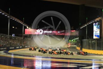 World © Octane Photographic Ltd. Formula 1 - Singapore Grand Prix - Race. The damaged Scuderia Ferrari SF70H re-enters the track at turn 1 after contact with Vettel. Marina Bay Street Circuit, Singapore. Sunday 17th September 2017. Digital Ref: