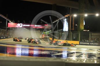 World © Octane Photographic Ltd. Formula 1 - Singapore Grand Prix - Race. The damaged Scuderia Ferrari SF70H makes contact with the Red Bull Racing RB13 of Max Verstappen who in turn hits the McLaren MCL32 of Fernando Alonso. Marina Bay Street Circuit, Singapore. Sunday 17th September 2017. Digital Ref:
