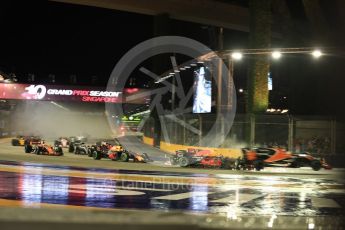 World © Octane Photographic Ltd. Formula 1 - Singapore Grand Prix - Race. The damaged Scuderia Ferrari SF70H makes contact with the Red Bull Racing RB13 of Max Verstappen who in turn hits the McLaren MCL32 of Fernando Alonso. Marina Bay Street Circuit, Singapore. Sunday 17th September 2017. Digital Ref: