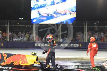World © Octane Photographic Ltd. Formula 1 - Singapore Grand Prix - Race. Max Verstappen and Kimi Raikkonen walk away from their wrecked Red Bull Racing RB13 and Scuderia Ferrari SF70H. Marina Bay Street Circuit, Singapore. Sunday 17th September 2017. Digital Ref: