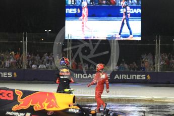 World © Octane Photographic Ltd. Formula 1 - Singapore Grand Prix - Race. Max Verstappen and Kimi Raikkonen walk away from their wrecked Red Bull Racing RB13 and Scuderia Ferrari SF70H. Marina Bay Street Circuit, Singapore. Sunday 17th September 2017. Digital Ref: