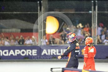 World © Octane Photographic Ltd. Formula 1 - Singapore Grand Prix - Race. Max Verstappen and Kimi Raikkonen walk away from their wrecked Red Bull Racing RB13 and Scuderia Ferrari SF70H. Marina Bay Street Circuit, Singapore. Sunday 17th September 2017. Digital Ref: