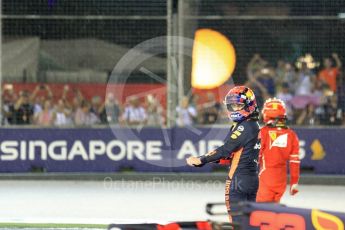World © Octane Photographic Ltd. Formula 1 - Singapore Grand Prix - Race. Max Verstappen and Kimi Raikkonen walk away from their wrecked Red Bull Racing RB13 and Scuderia Ferrari SF70H. Marina Bay Street Circuit, Singapore. Sunday 17th September 2017. Digital Ref: