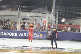 World © Octane Photographic Ltd. Formula 1 - Singapore Grand Prix - Race. Max Verstappen and Kimi Raikkonen walk away from their wrecked Red Bull Racing RB13 and Scuderia Ferrari SF70H. Marina Bay Street Circuit, Singapore. Sunday 17th September 2017. Digital Ref:
