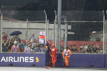 World © Octane Photographic Ltd. Formula 1 - Singapore Grand Prix - Race. Max Verstappen and Kimi Raikkonen walk away from their wrecked Red Bull Racing RB13 and Scuderia Ferrari SF70H. Marina Bay Street Circuit, Singapore. Sunday 17th September 2017. Digital Ref: