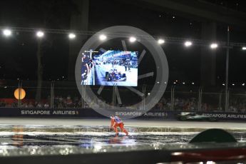 World © Octane Photographic Ltd. Formula 1 - Singapore Grand Prix - Race. marshals move to clear the the turn 1 debris. Marina Bay Street Circuit, Singapore. Sunday 17th September 2017. Digital Ref: