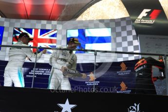 World © Octane Photographic Ltd. Formula 1 - Singapore Grand Prix - Podium. Lewis Hamilton - Mercedes AMG Petronas F1 W08 EQ Energy+, Daniel Ricciardo - Red Bull Racing RB13 and Valtteri Bottas. Marina Bay Street Circuit, Singapore. Sunday 17th September 2017. Digital Ref: