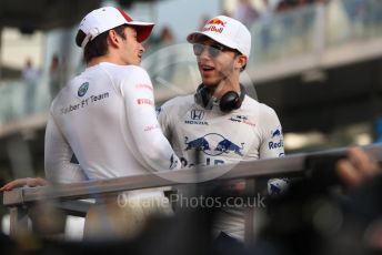 World © Octane Photographic Ltd. Formula 1 – Abu Dhabi GP - Drivers Parade. Alfa Romeo Sauber F1 Team C37 – Charles Leclerc and Scuderia Toro Rosso STR13 – Pierre Gasly. Yas Marina Circuit, Abu Dhabi. Sunday 25th November 2018.