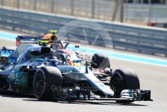 World © Octane Photographic Ltd. Formula 1 –  Abu Dhabi GP - Practice 1. Mercedes AMG Petronas Motorsport AMG F1 W09 EQ Power+ - Valtteri Bottas and Aston Martin Red Bull Racing TAG Heuer RB14 – Max Verstappen. Yas Marina Circuit, Abu Dhabi. Friday 23rd November 2018.