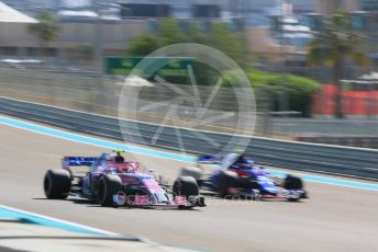 World © Octane Photographic Ltd. Formula 1 –  Abu Dhabi GP - Practice 1. Racing Point Force India VJM11 - Esteban Ocon and Scuderia Toro Rosso STR13 – Pierre Gasly. Yas Marina Circuit, Abu Dhabi. Friday 23rd November 2018.