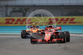 World © Octane Photographic Ltd. Formula 1 –  Abu Dhabi GP - Practice 2. Scuderia Ferrari SF71-H – Sebastian Vettel and McLaren MCL33 – Stoffel Vandoorne. Yas Marina Circuit, Abu Dhabi. Friday 23rd November 2018.
