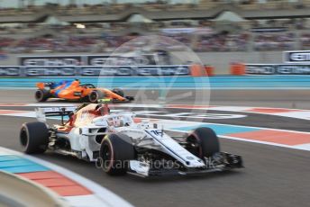World © Octane Photographic Ltd. Formula 1 –  Abu Dhabi GP - Qualifying. Alfa Romeo Sauber F1 Team C37 – Charles Leclerc and McLaren MCL33 – Fernando Alonso. Yas Marina Circuit, Abu Dhabi. Saturday 24th November 2018.