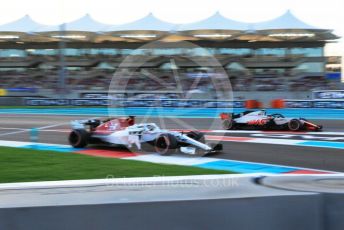 World © Octane Photographic Ltd. Formula 1 –  Abu Dhabi GP - Qualifying. Alfa Romeo Sauber F1 Team C37 – Marcus Ericsson and Haas F1 Team VF-18 – Kevin Magnussen. Yas Marina Circuit, Abu Dhabi. Saturday 24th November 2018.