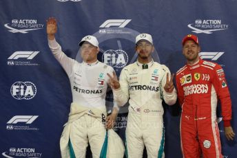 World © Octane Photographic Ltd. Formula 1 –  Abu Dhabi GP - Qualifying. Mercedes AMG Petronas Motorsport AMG F1 W09 EQ Power+ - Lewis Hamilton and Valtterri Bottas with Scuderia Ferrari SF71-H – Sebastian Vettel. . Yas Marina Circuit, Abu Dhabi. Saturday 24th November 2018.