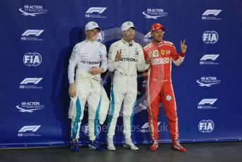 World © Octane Photographic Ltd. Formula 1 –  Abu Dhabi GP - Qualifying. Mercedes AMG Petronas Motorsport AMG F1 W09 EQ Power+ - Lewis Hamilton and Valtterri Bottas with Scuderia Ferrari SF71-H – Sebastian Vettel. . Yas Marina Circuit, Abu Dhabi. Saturday 24th November 2018.
