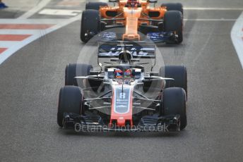 World © Octane Photographic Ltd. Formula 1 –  Abu Dhabi GP - Race. Haas F1 Team VF-18 – Romain Grosjean and McLaren MCL33 – Stoffel Vandoorne. Yas Marina Circuit, Abu Dhabi. Sunday 25th November 2018.