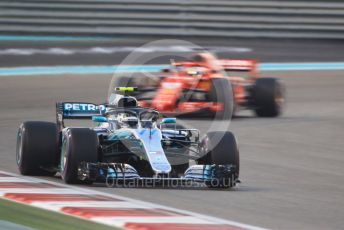 World © Octane Photographic Ltd. Formula 1 –  Abu Dhabi GP - Race. Mercedes AMG Petronas Motorsport AMG F1 W09 EQ Power+ - Valtteri Bottas and Scuderia Ferrari SF71-H – Sebastian Vettel. Yas Marina Circuit, Abu Dhabi. Sunday 25th November 2018.