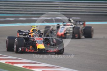 World © Octane Photographic Ltd. Formula 1 –  Abu Dhabi GP - Race. Aston Martin Red Bull Racing TAG Heuer RB14 – Max Verstappen and Haas F1 Team VF-18 – Romain Grosjean. Yas Marina Circuit, Abu Dhabi. Sunday 25th November 2018.