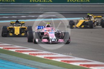 World © Octane Photographic Ltd. Formula 1 –  Abu Dhabi GP - Race. Racing Point Force India VJM11 - Esteban Ocon and Renault Sport F1 Team RS18 – Nico Hulkenberg and Carlos Sainz. Yas Marina Circuit, Abu Dhabi. Sunday 25th November 2018.