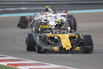 World © Octane Photographic Ltd. Formula 1 –  Abu Dhabi GP - Race. Renault Sport F1 Team RS18 – Carlos Sainz, Alfa Romeo Sauber F1 Team C37 – Marcus Ericsson and Haas F1 Team VF-18 – Kevin Magnussen. Yas Marina Circuit, Abu Dhabi. Sunday 25th November 2018.