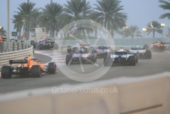 World © Octane Photographic Ltd. Formula 1 –  Abu Dhabi GP - Race. The pack head into T3 on the first lap. Yas Marina Circuit, Abu Dhabi. Sunday 25th November 2018.