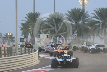 World © Octane Photographic Ltd. Formula 1 –  Abu Dhabi GP - Race. The pack head into T3 on the first lap. Yas Marina Circuit, Abu Dhabi. Sunday 25th November 2018.