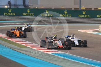 World © Octane Photographic Ltd. Formula 1 –  Abu Dhabi GP - Race. Haas F1 Team VF-18 – Kevin Magnussen and Williams Martini Racing FW41 – Lance Stroll. Yas Marina Circuit, Abu Dhabi. Sunday 25th November 2018.