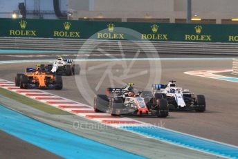 World © Octane Photographic Ltd. Formula 1 –  Abu Dhabi GP - Race. Haas F1 Team VF-18 – Kevin Magnussen and Williams Martini Racing FW41 – Lance Stroll. Yas Marina Circuit, Abu Dhabi. Sunday 25th November 2018.