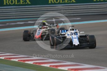 World © Octane Photographic Ltd. Formula 1 –  Abu Dhabi GP - Race. Williams Martini Racing FW41 – Lance Stroll and Haas F1 Team VF-18 – Kevin Magnussen. Yas Marina Circuit, Abu Dhabi. Sunday 25th November 2018.
