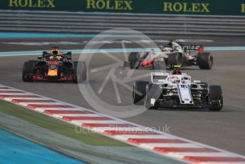 World © Octane Photographic Ltd. Formula 1 –  Abu Dhabi GP - Race. Alfa Romeo Sauber F1 Team C37 – Charles Leclerc, Aston Martin Red Bull Racing TAG Heuer RB14 – Daniel Ricciardo and Haas F1 Team VF-18 – Romain Grosjean. Yas Marina Circuit, Abu Dhabi. Sunday 25th November 2018.