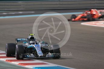 World © Octane Photographic Ltd. Formula 1 –  Abu Dhabi GP - Race. Mercedes AMG Petronas Motorsport AMG F1 W09 EQ Power+ - Valtteri Bottas and Scuderia Ferrari SF71-H – Sebastian Vettel. Yas Marina Circuit, Abu Dhabi. Sunday 25th November 2018.