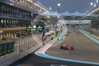 World © Octane Photographic Ltd. Formula 1 –  Abu Dhabi GP - Race. Scuderia Ferrari SF71-H – Kimi Raikkonen and Alfa Romeo Sauber F1 Team C37 – Charles Leclerc. Yas Marina Circuit, Abu Dhabi. Sunday 25th November 2018.