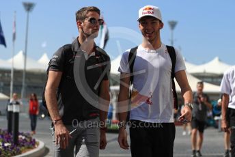 World © Octane Photographic Ltd. Formula 1 –  Abu Dhabi GP - Paddock. Alfa Romeo Sauber F1 Team C37 – Charles Leclerc and Haas F1 Team VF-18 – Romain Grosjean. Yas Marina Circuit, Abu Dhabi. Friday 23rd November 2018.