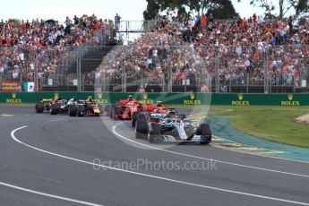 World © Octane Photographic Ltd. Formula 1 – Australian GP - Race. Mercedes AMG Petronas Motorsport AMG F1 W09 EQ Power+ - Lewis Hamilton leads the pack on the opening lap. Albert Park, Melbourne, Australia. Sunday 25th March 2018.