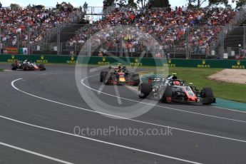 World © Octane Photographic Ltd. Formula 1 – Australian GP - Race. Haas F1 Team VF-18 – Kevin Magnussen and Romain Grosjean sandwiching the Aston Martin Red Bull Racing TAG Heuer RB14 of Max Verstappen. Albert Park, Melbourne, Australia. Sunday 25th March 2018.