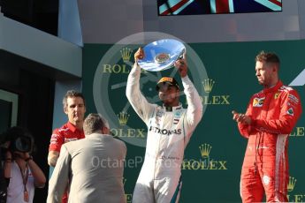 World © Octane Photographic Ltd. Formula 1 – Australian GP - Podium. Scuderia Ferrari SF71-H – Sebastian Vettel (1st), Mercedes AMG Petronas Motorsport AMG F1 W09 EQ Power+ - Lewis Hamilton (2nd) – Inake Rueda – Ferrari Race Strategist. Albert Park, Melbourne, Australia. Sunday 25th March 2018.