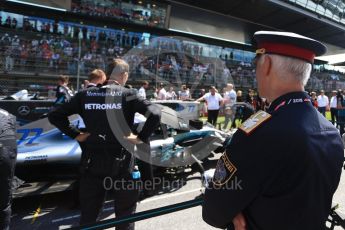 World © Octane Photographic Ltd. Formula 1 – Austrian GP - Grid. Police watches the Mercedes AMG Petronas Motorsport AMG F1 W09 EQ Power+ - Valtteri Bottas. Red Bull Ring, Spielberg, Austria. Sunday 1st July 2018.