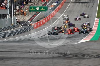 World © Octane Photographic Ltd. Formula 1 – Austrian GP - Race. Mercedes AMG Petronas Motorsport AMG F1 W09 EQ Power+ - Valtteri Bottas, Lewis Hamilton and Scuderia Ferrari SF71-H – Kimi Raikkonen. . Red Bull Ring, Spielberg, Austria. Sunday 1st July 2018.