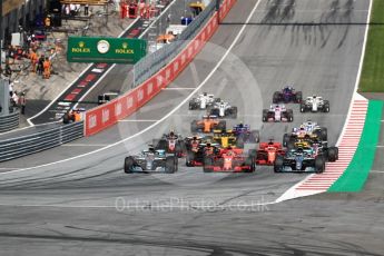 World © Octane Photographic Ltd. Formula 1 – Austrian GP - Race. Mercedes AMG Petronas Motorsport AMG F1 W09 EQ Power+ - Valtteri Bottas, Lewis Hamilton and Scuderia Ferrari SF71-H – Kimi Raikkonen. . Red Bull Ring, Spielberg, Austria. Sunday 1st July 2018.