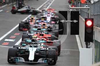 World © Octane Photographic Ltd. Formula 1 – Belgian GP - Qualifying. Mercedes AMG Petronas Motorsport AMG F1 W09 EQ Power+ - Valtteri Bottas at the front of the queue waiting on green light. Spa-Francorchamps, Belgium. Saturday 25th August 2018.