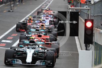 World © Octane Photographic Ltd. Formula 1 – Belgian GP - Qualifying. Mercedes AMG Petronas Motorsport AMG F1 W09 EQ Power+ - Valtteri Bottas at the front of the queue waiting on green light. Spa-Francorchamps, Belgium. Saturday 25th August 2018.