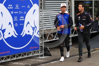 World © Octane Photographic Ltd. Formula 1 – Belgian GP - Paddock. Scuderia Toro Rosso STR13 – Pierre Gasly and Aston Martin Red Bull Racing TAG Heuer RB14 – Daniel Ricciardo. Spa-Francorchamps, Belgium. Friday 24th August 2018.