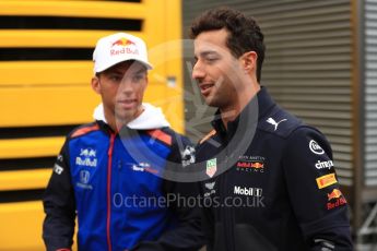 World © Octane Photographic Ltd. Formula 1 – Belgian GP - Paddock. Scuderia Toro Rosso STR13 – Pierre Gasly and Aston Martin Red Bull Racing TAG Heuer RB14 – Daniel Ricciardo. Spa-Francorchamps, Belgium. Friday 24th August 2018.